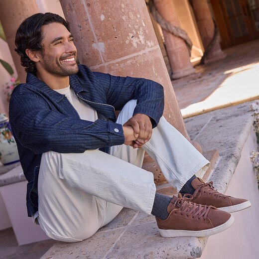 Model wearing Men's Sneaker style.