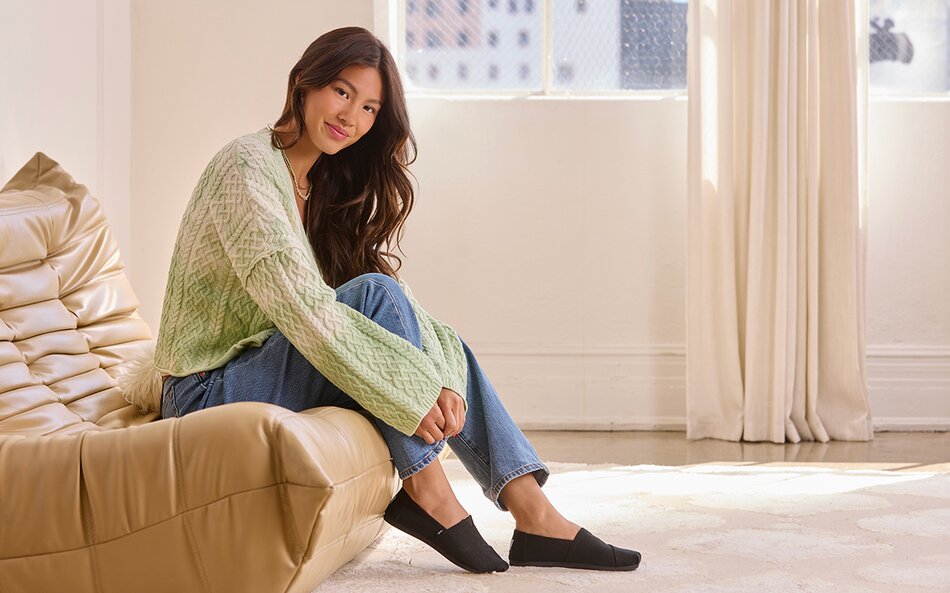 Model wearing women's Alpargata in all black heritage canvas shown.
