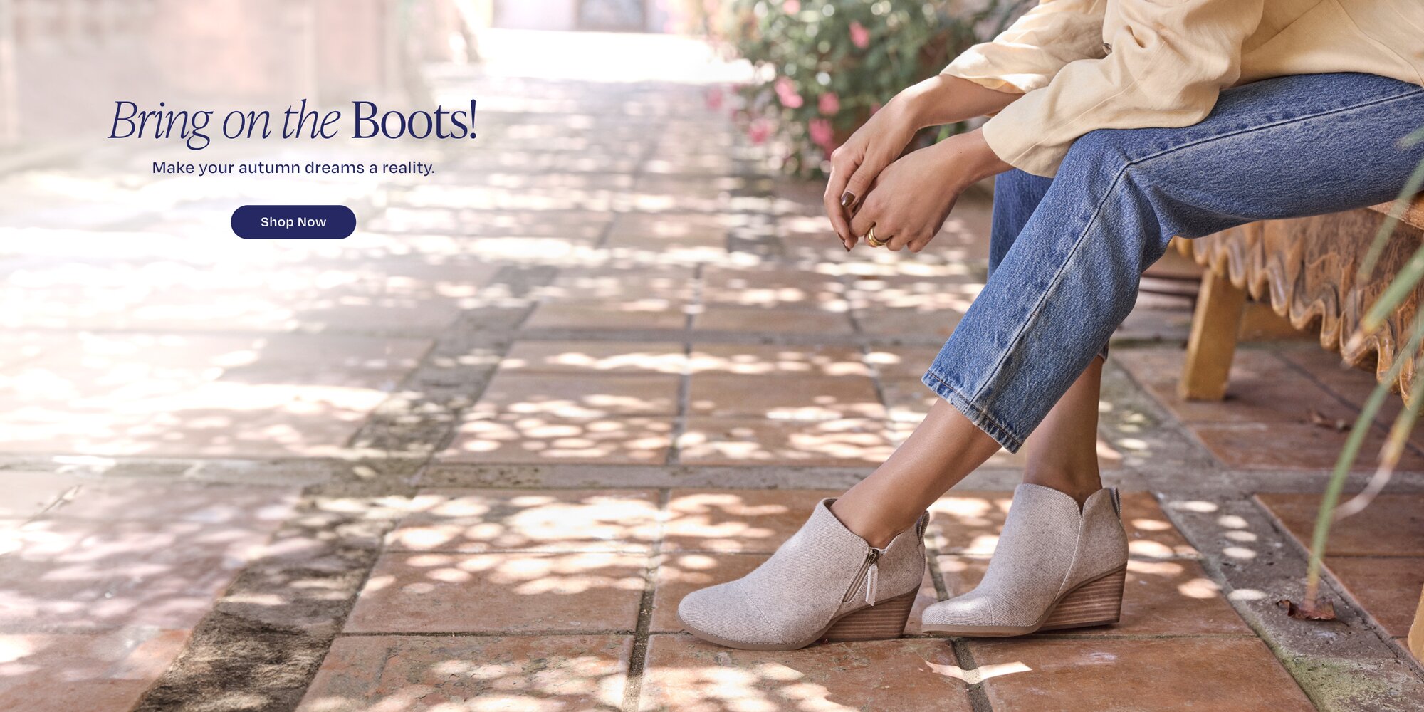 Bring on the Boots! Make your autumn dreams a reality. Shop Now. Model wearing Goldie Wedge Boot in natural glimmer shown.