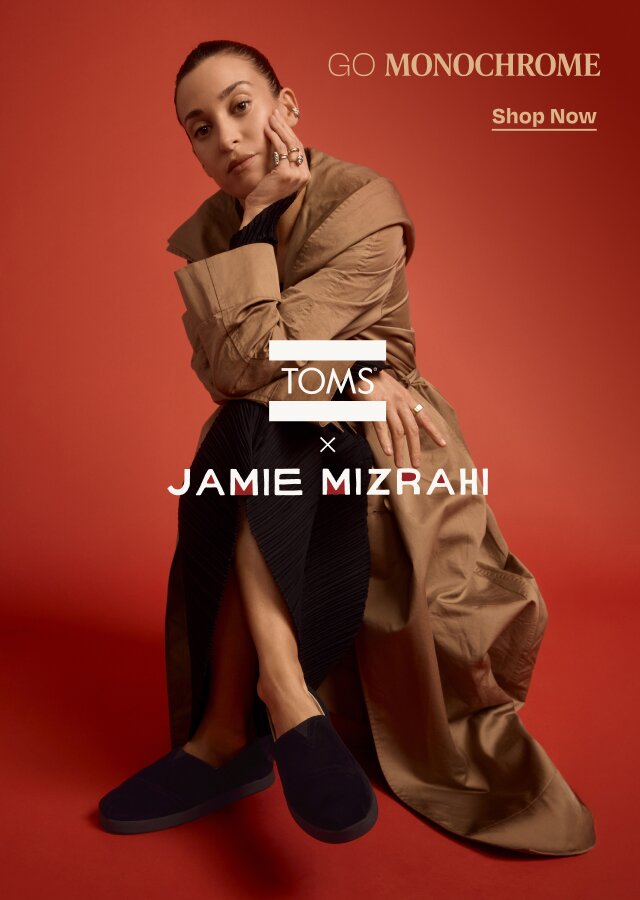 Go Monochrome. Shop Now. TOMS x Jamie Mizrahi logo. Jamie Mizrahi wearing Alpargatas shown.