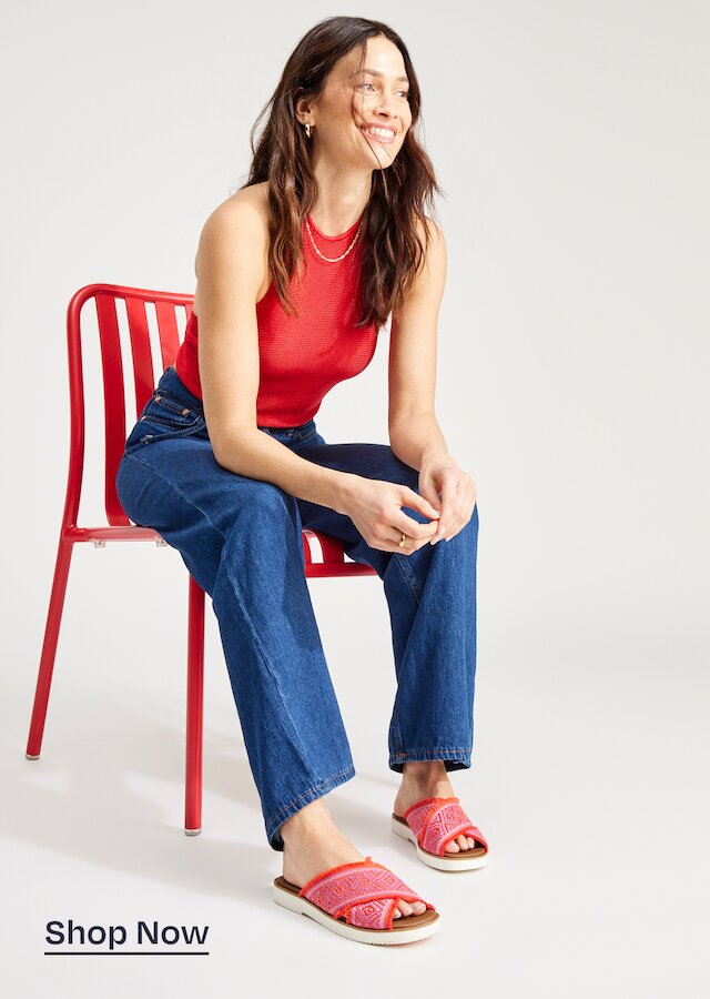 Model wearing women's Mae Crossover Slide Sandal in flame global woven shown. Shop Now.
