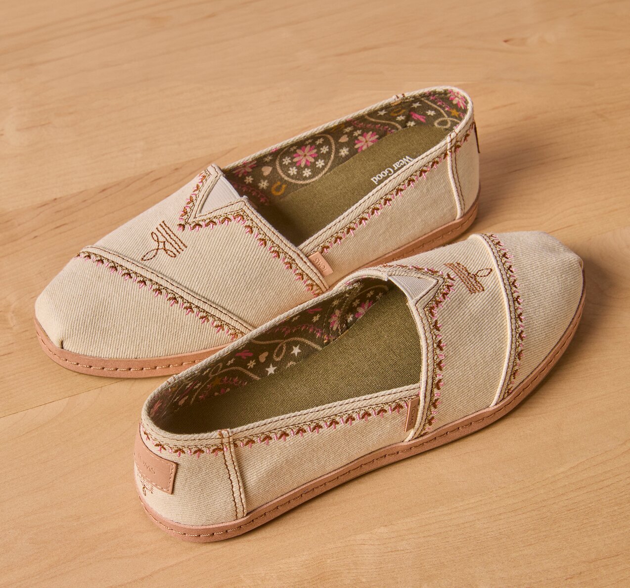 Women's Alpargata Leather Wrap in beige with western embroidery shown.