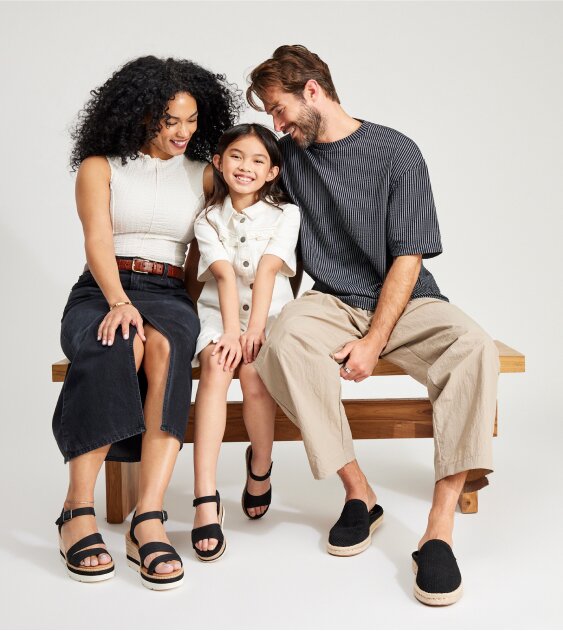 Models wearing various TOMS shoes shown.