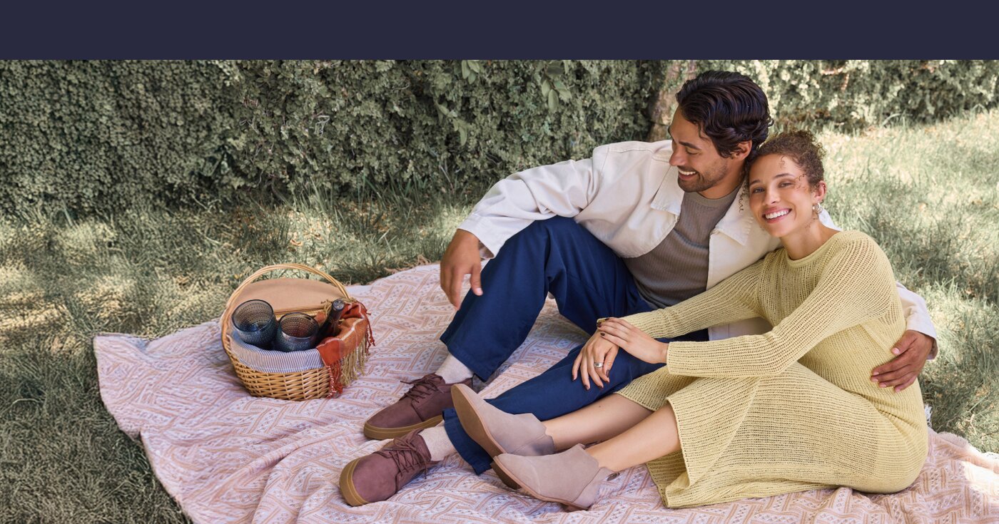 Models wearing TOMS shoes shown.