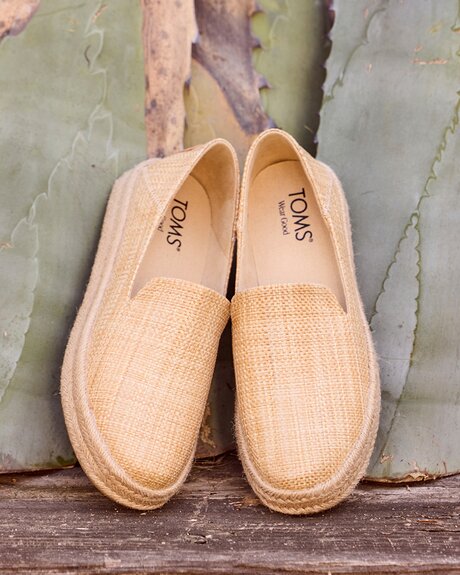 Women's Carolina Espadrille in almond raffia shown.