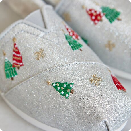 Closeup of Alpargata Classic in Silver Christmas Tree Embroidery.