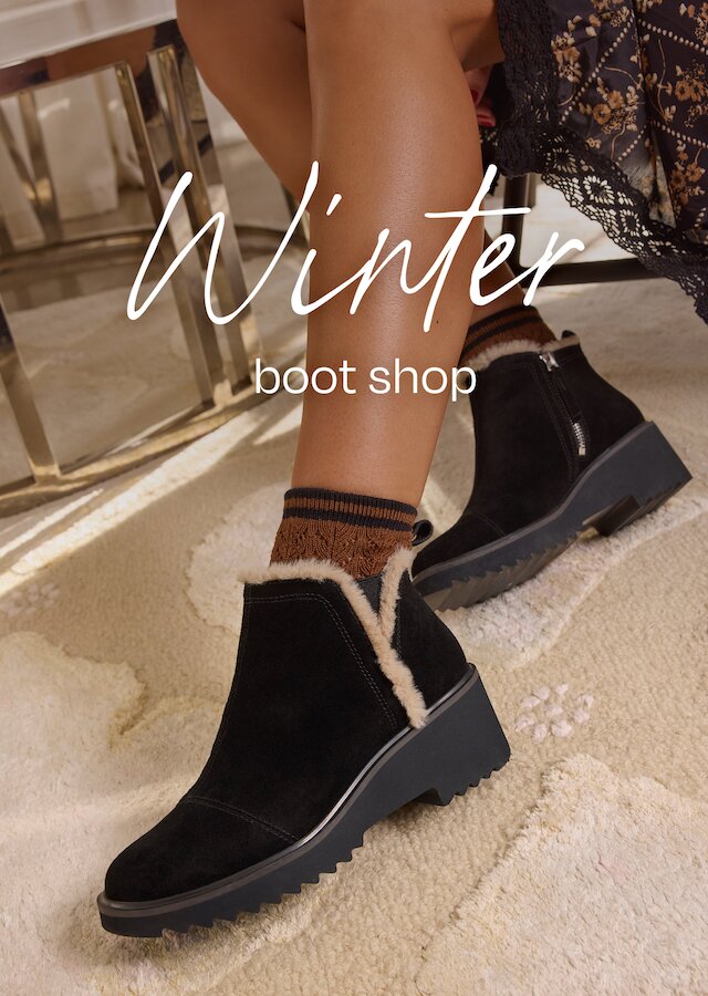 Winter boot shop. Maude Wedge Boot in black suede faux fur shown.