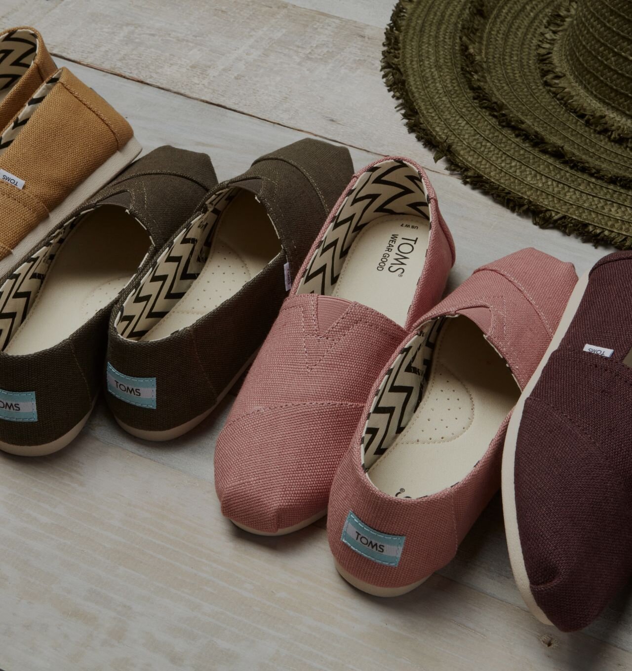 TOMS Wear Good logo and Alpargatas shown.