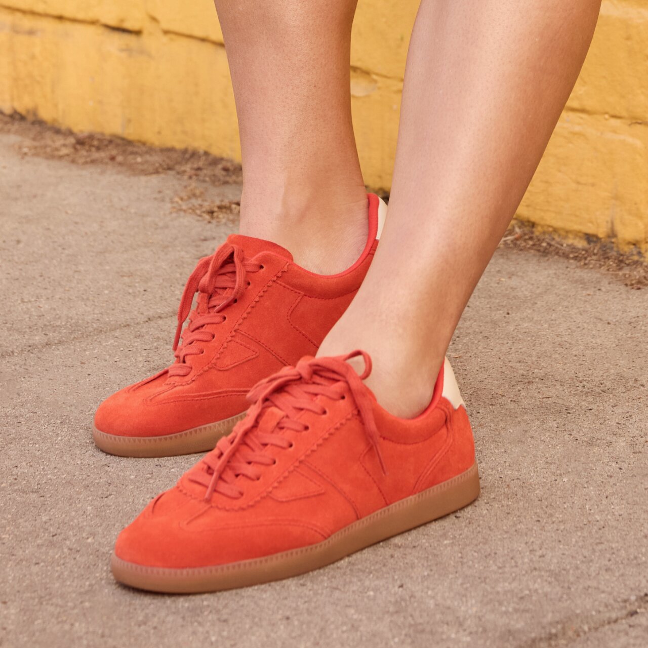 Model wearing women's Collins Casual Lace-Up Sneaker in flame suede and leather shown.