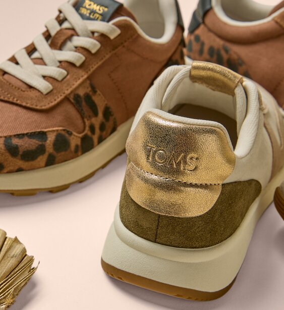 Women's TRVL LITE Retro Runner Sneakers in various colors shown.
