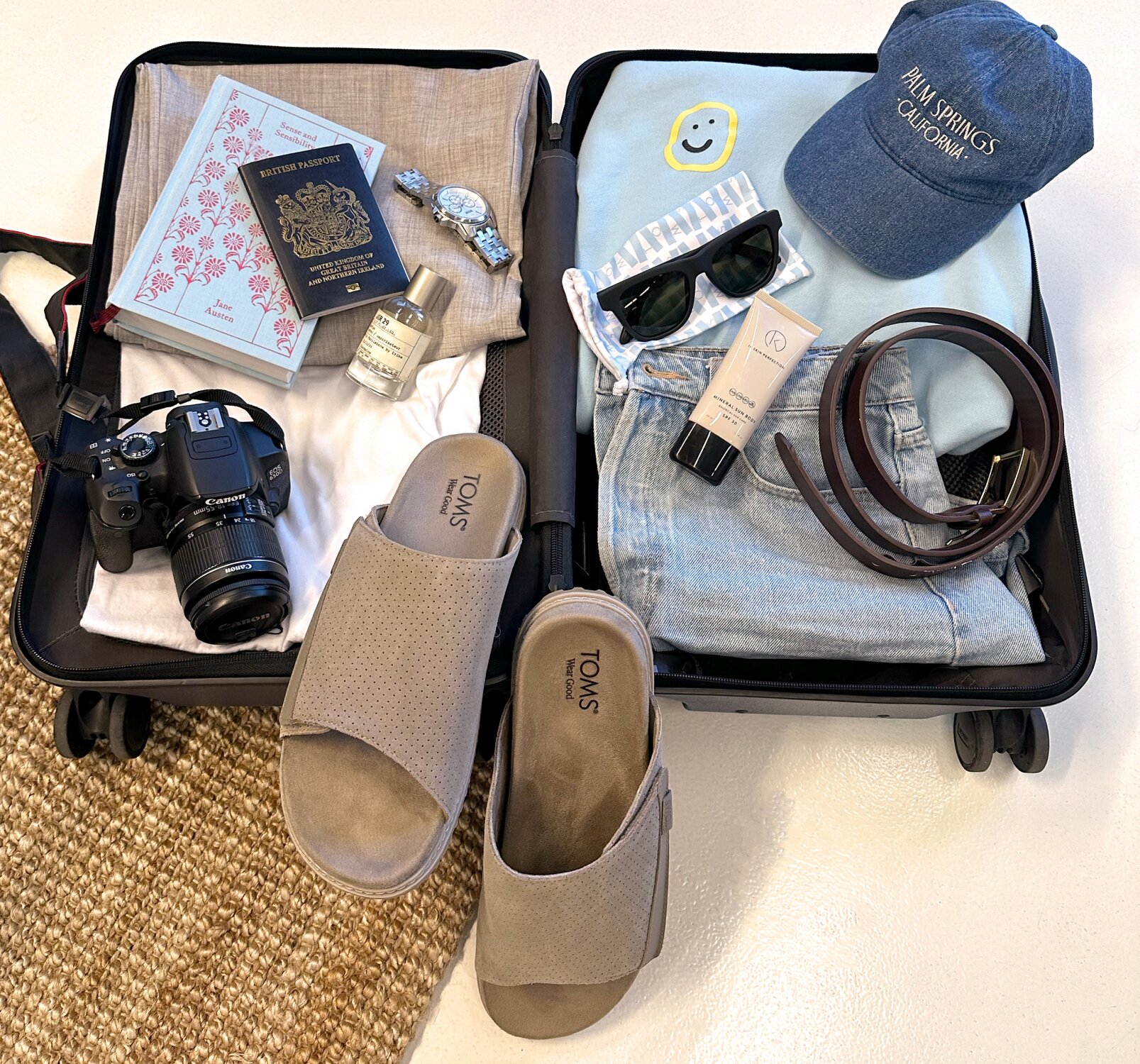 The perfect pair of dark grey suede Danilo sandal and matte black Dalston Traveler Sunglasses