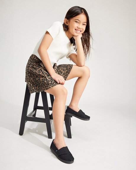 Kids' Alpargata Kids Shoe in black canvas shown.