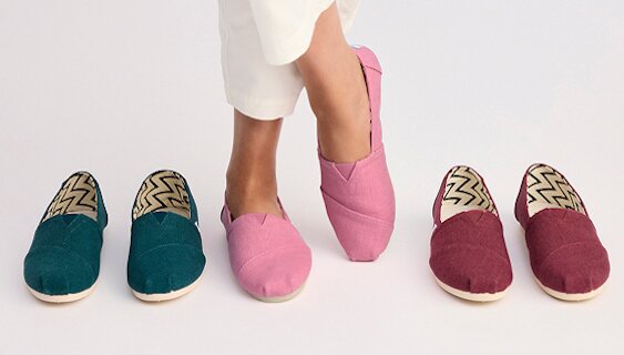 A model wearing TOMS Alpargata and various other Alpargatas shown.