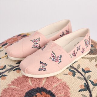 Alpargata Classic in pale rose canvas with embroidered butterflies shown.