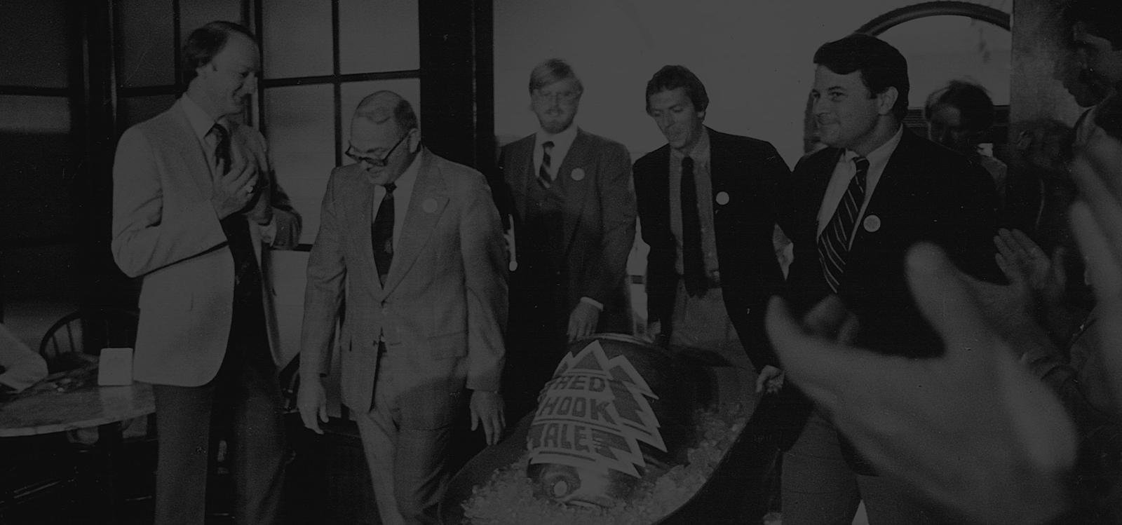 Redhook founders with beer keg in black and white. 