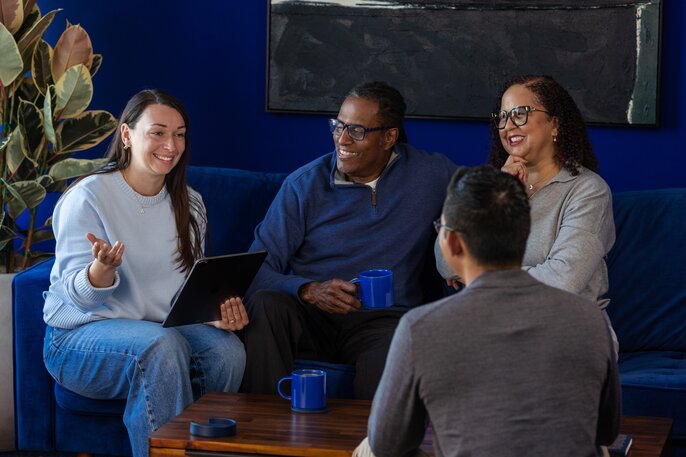 Small group discussing the Bible