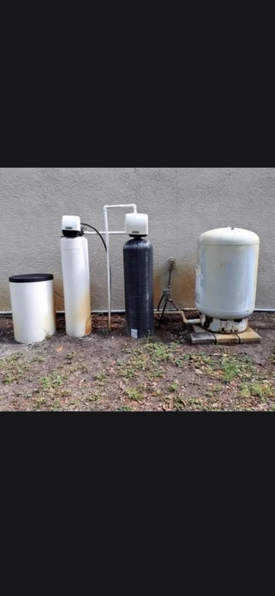 Older whole-home water treatment system before an equipment upgrade