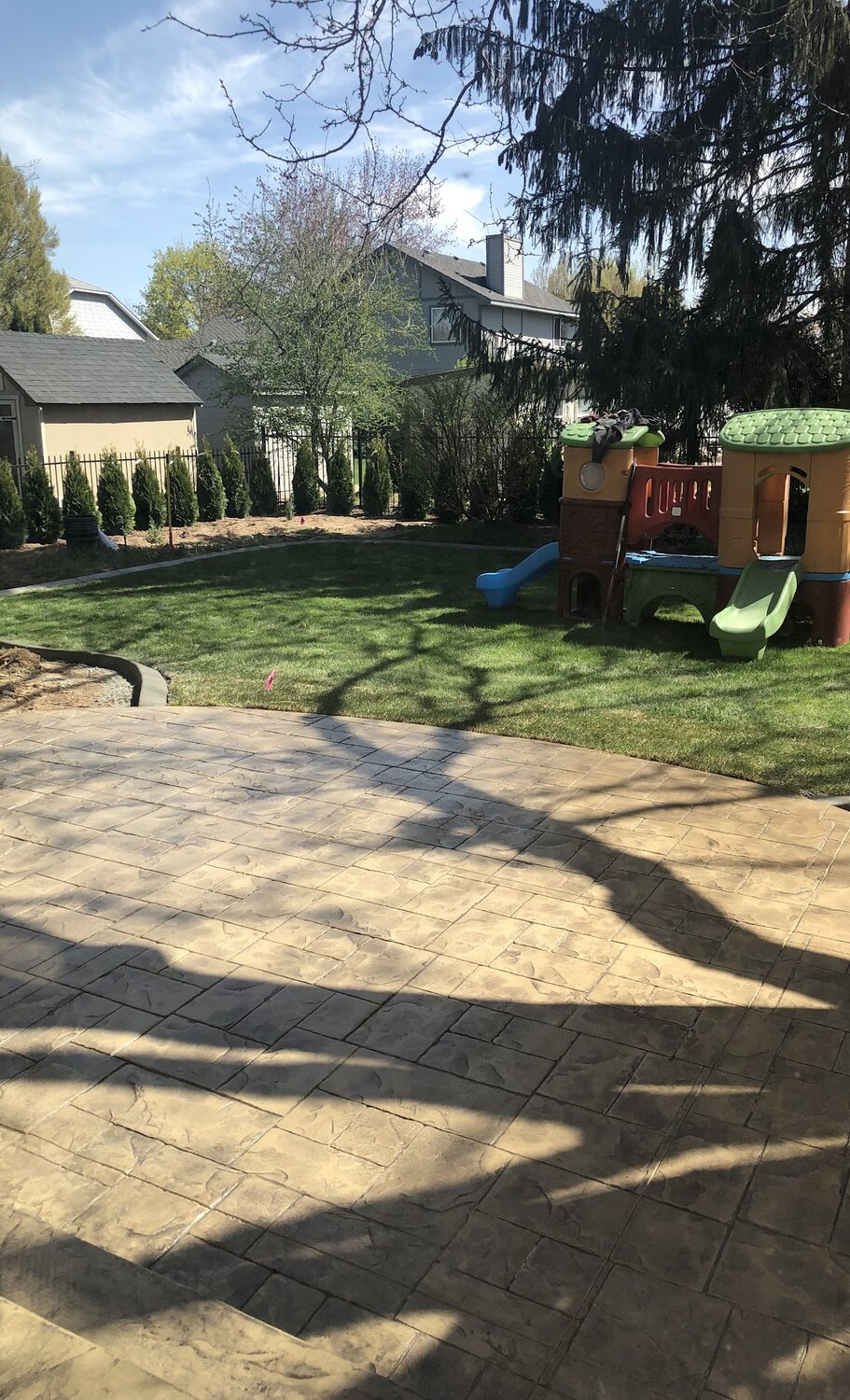 Beautiful stamped concrete patio with custom design