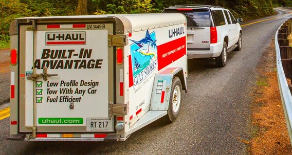 SUV towing an U-Haul Trailer