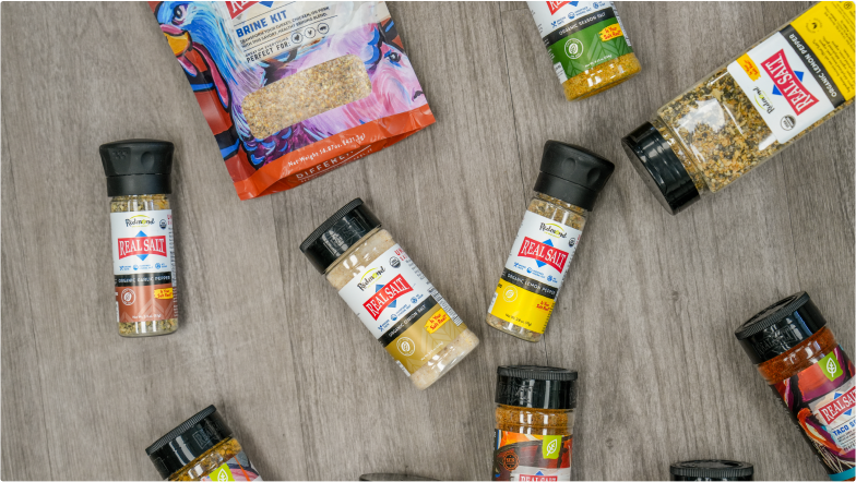 A variety of Redmond Real Salt seasoning shakers.