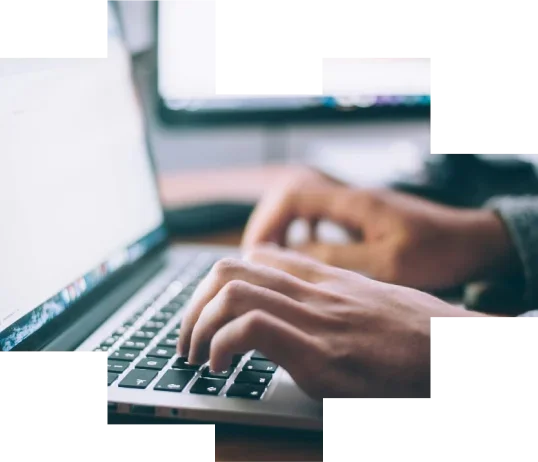 Hands and a laptop