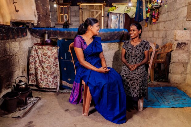 Pramila and Malathy sitting in a room