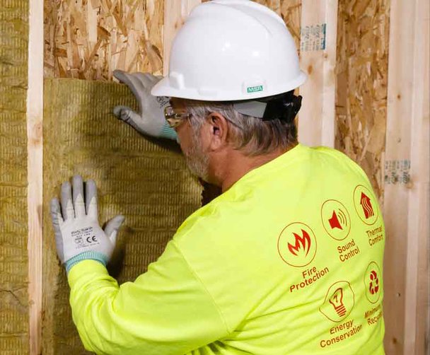 Work installing insulation