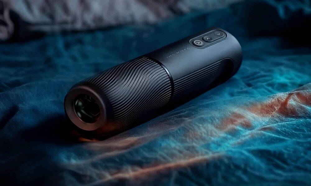 Arcwave Orbit der ligger på et blåt lagen i en seng