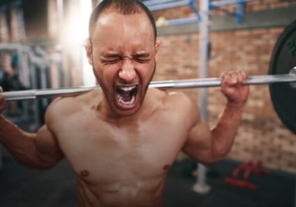 man in gym screaming