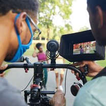 Closeup of cinematographers on set