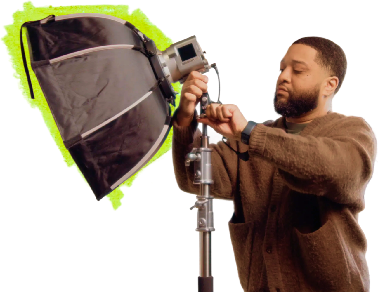 Person setting up a studio light