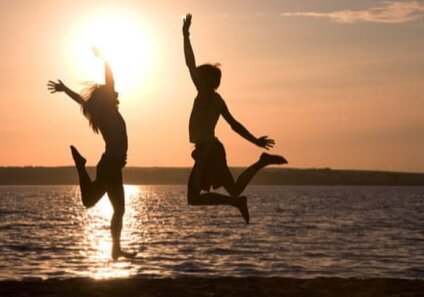 couple jumping happily