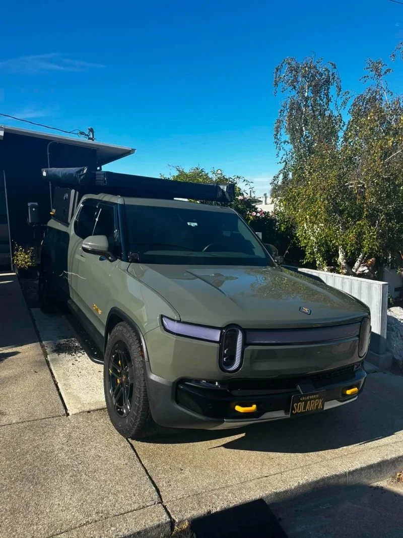 Rivian R1T pickup with a polished finish after detailing