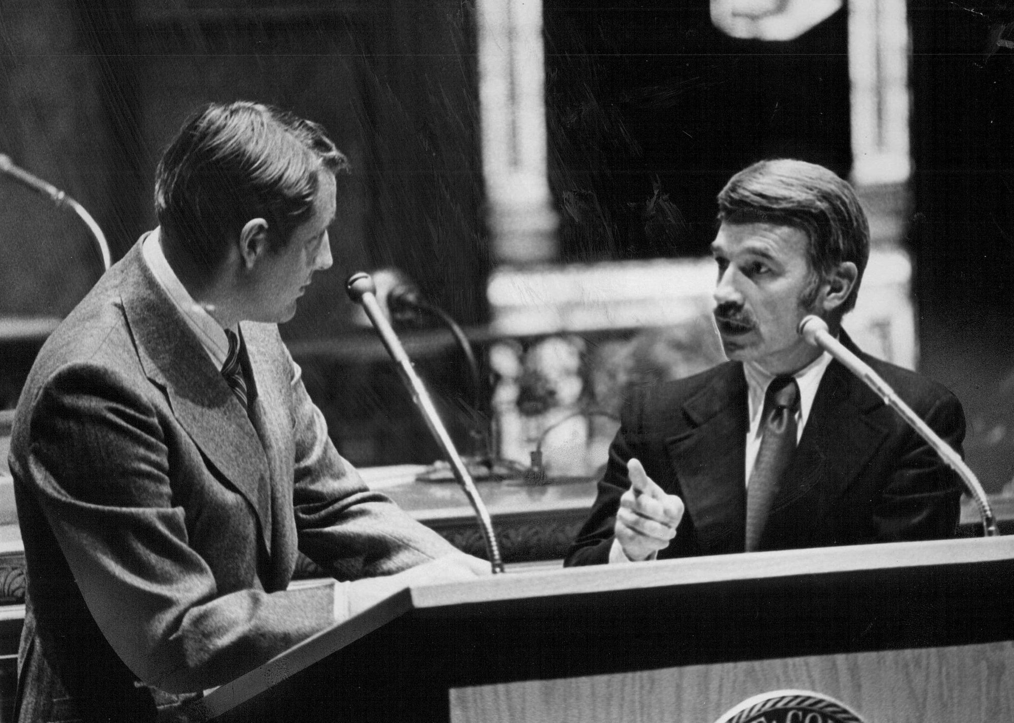 Photograph of government officials debating a piece of legislation - Duane Howell // Getty Images