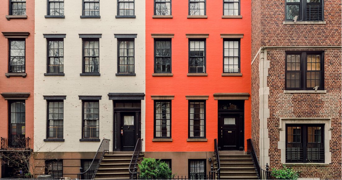 "Row of multicolor brownstone buildings