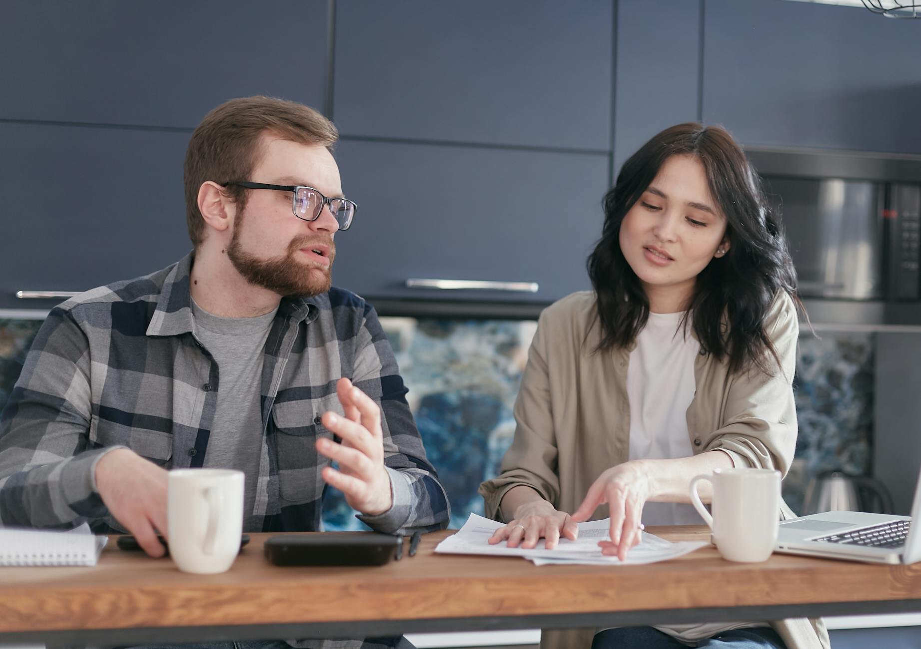 Couple trying to figure out if mortgage rates go down in a recession
