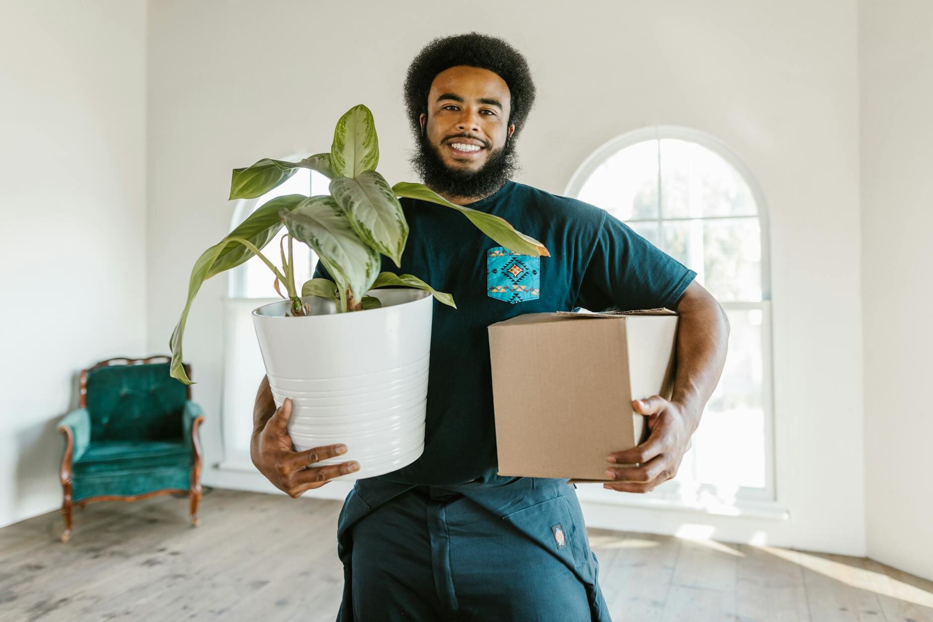 Man moving into new home after getting a mortgage commitment letter