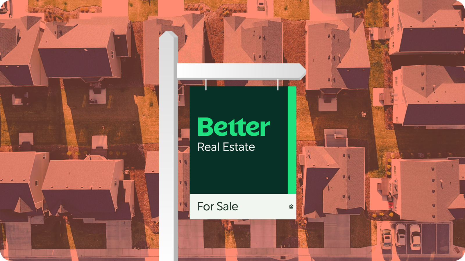 "Image of Better Real Estate For Sale sign with subdivision of homes in the background