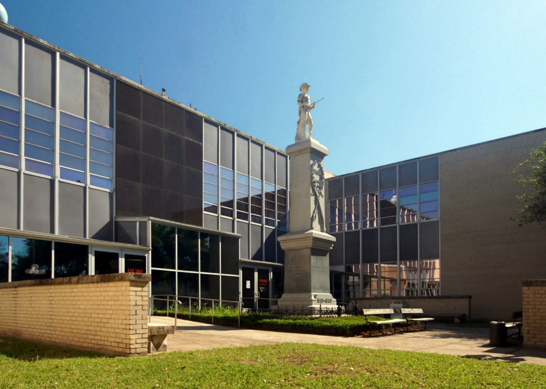 “Photograph of statue in the courtyard of an administrative building” - Source: Canva