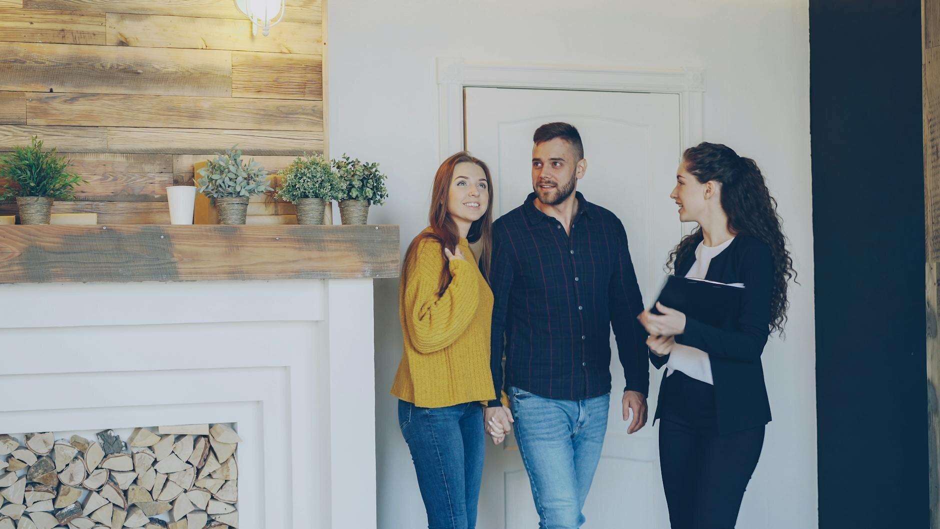 Couple touring home after working with lender that offers Rapid Rescore service.