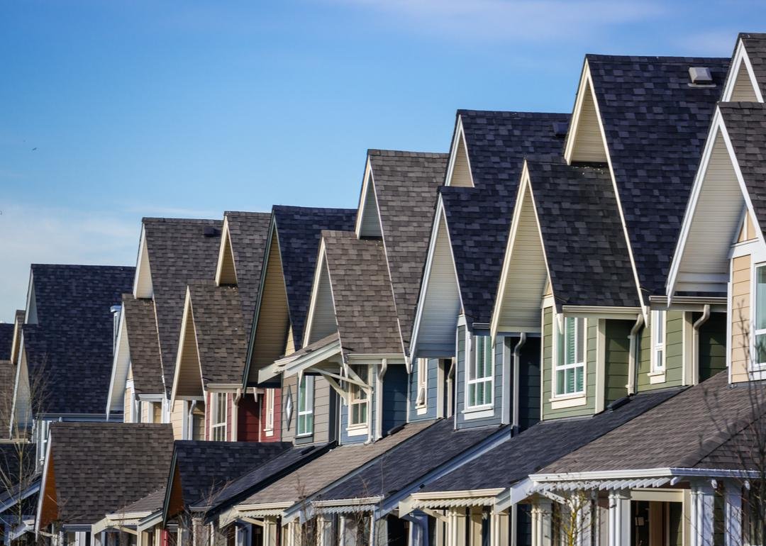 Row homes with pointed roofs - Source: Volodymyr Kyrylyuk // Shutterstock