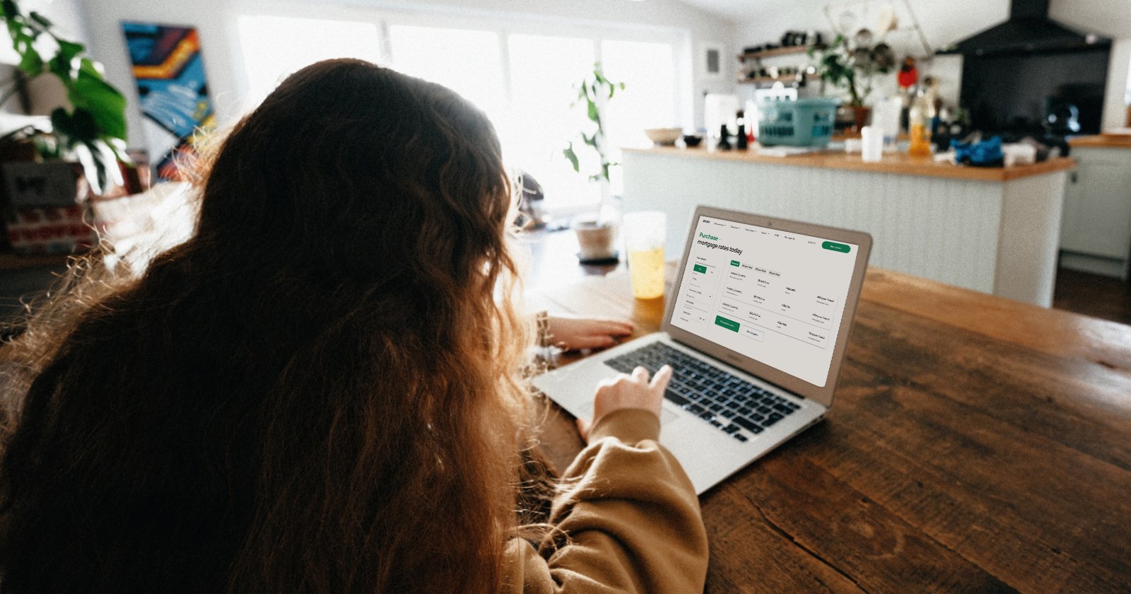 Person on Laptop Reviewing Mortgage Rates on Better.com