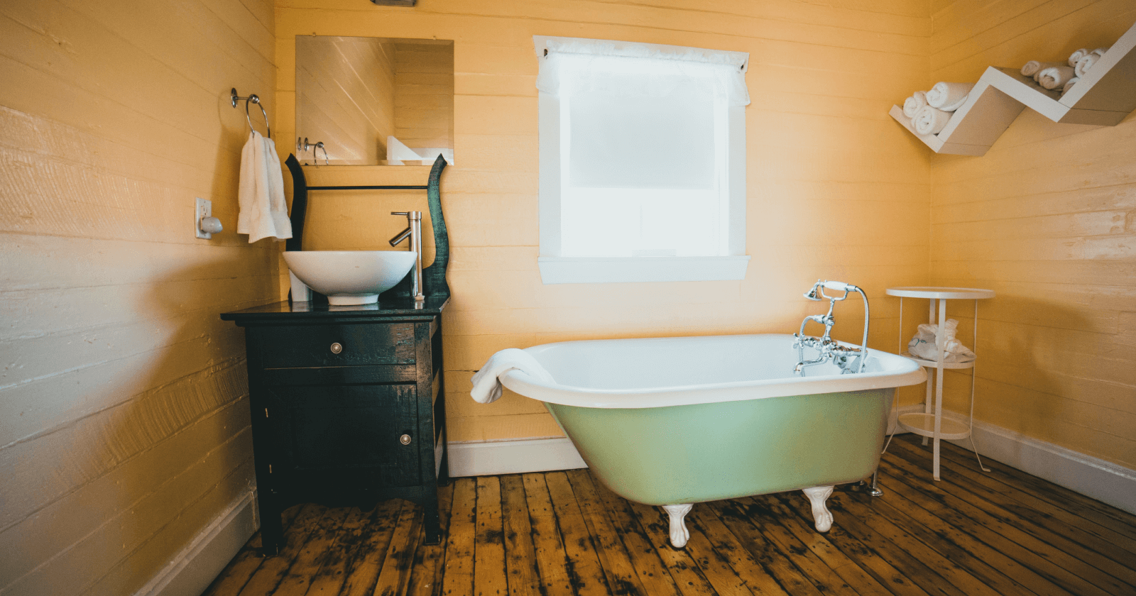 Bathroom with Clawfoot Tub and Wood Floor