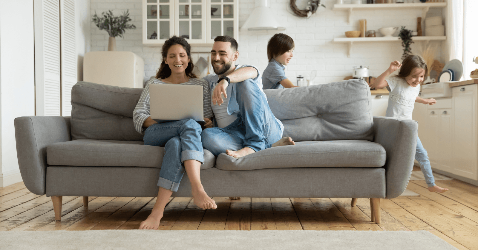 Modern Living Room with Family of Four