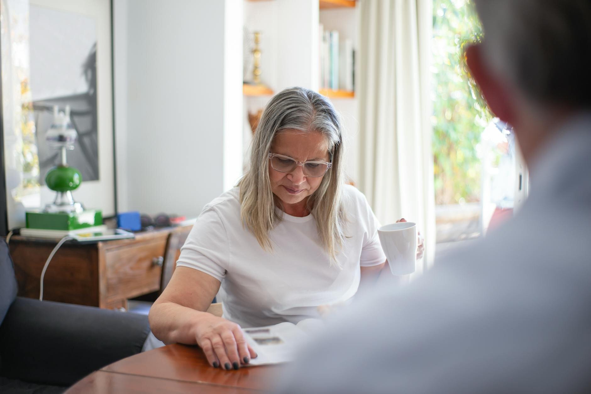 Homeowner weighing the decision to sell or stay with a low mortgage rate