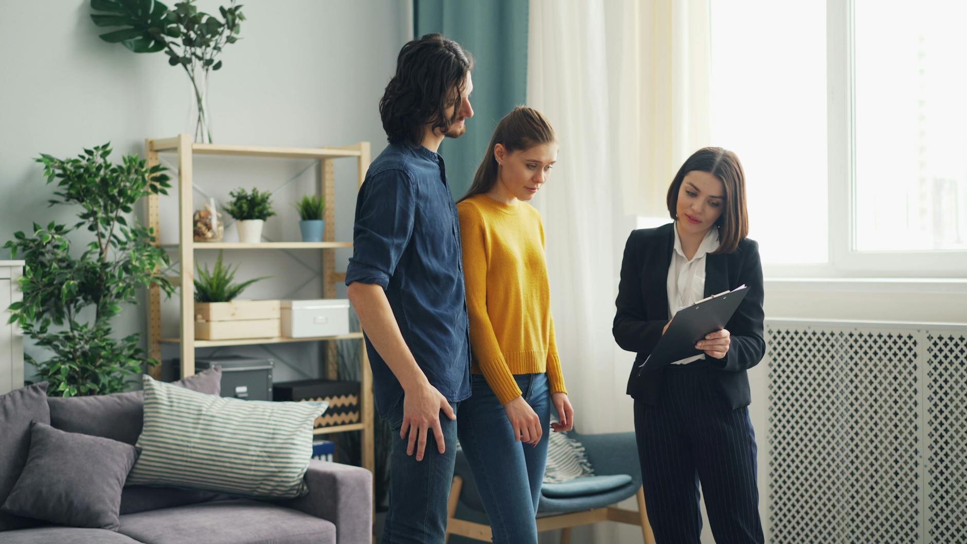 Couple buying a home learning if closing costs are tax-deductible.
