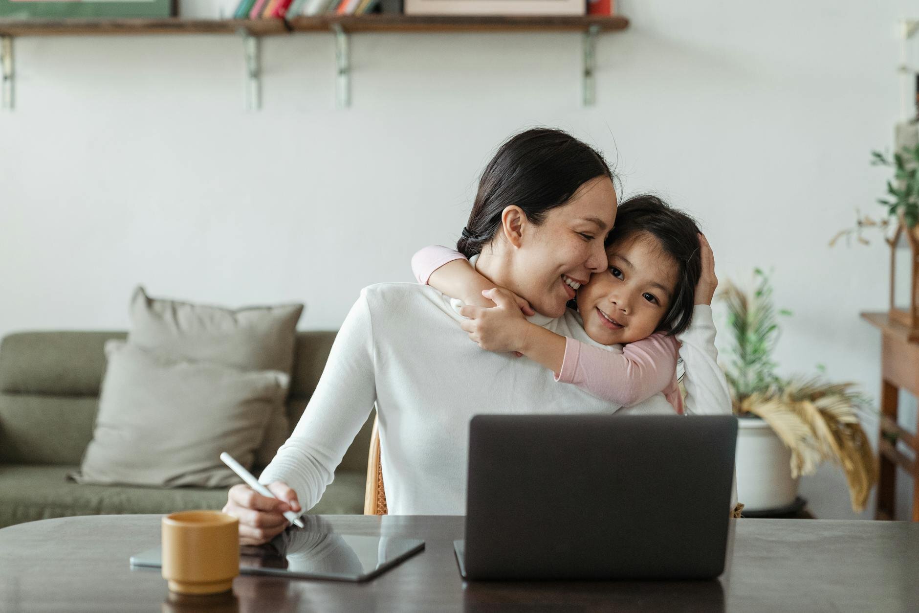 Mother and daughter in home learning what income you need for a 200k mortgage.