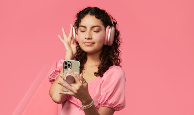 woman on phone listening to headphones