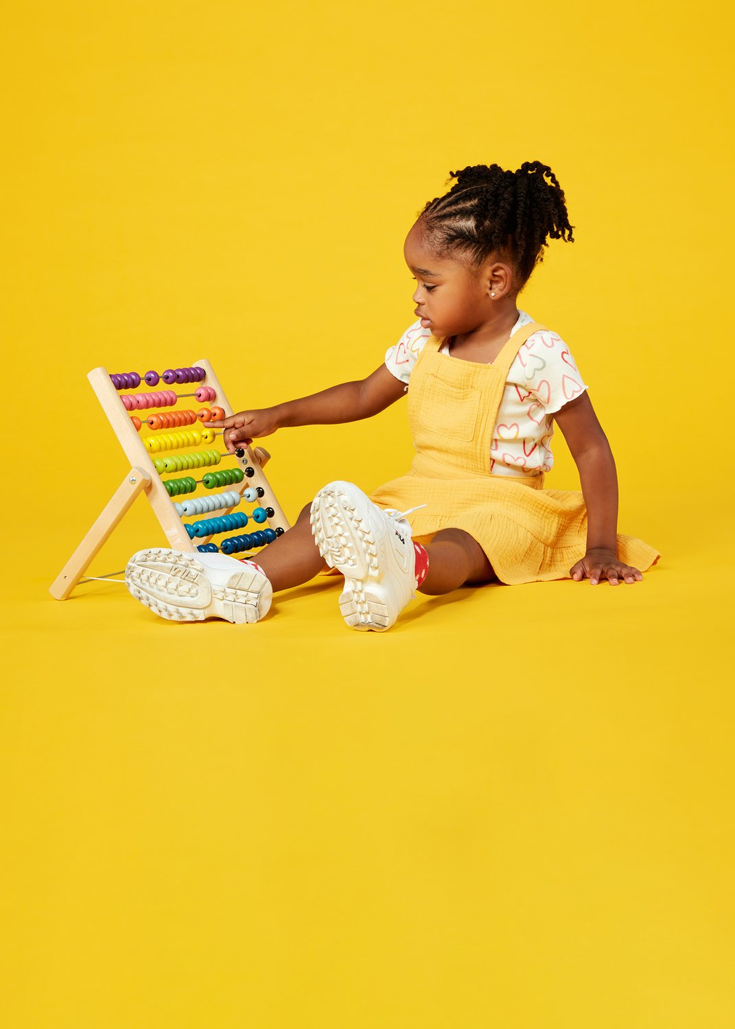 Child and abacus