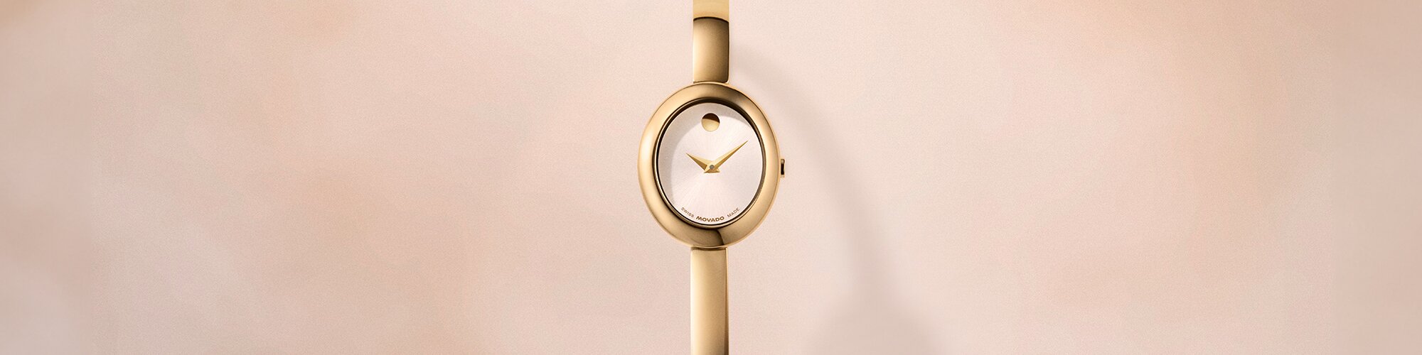 Gold tone Museum Bangle watch with oval dial